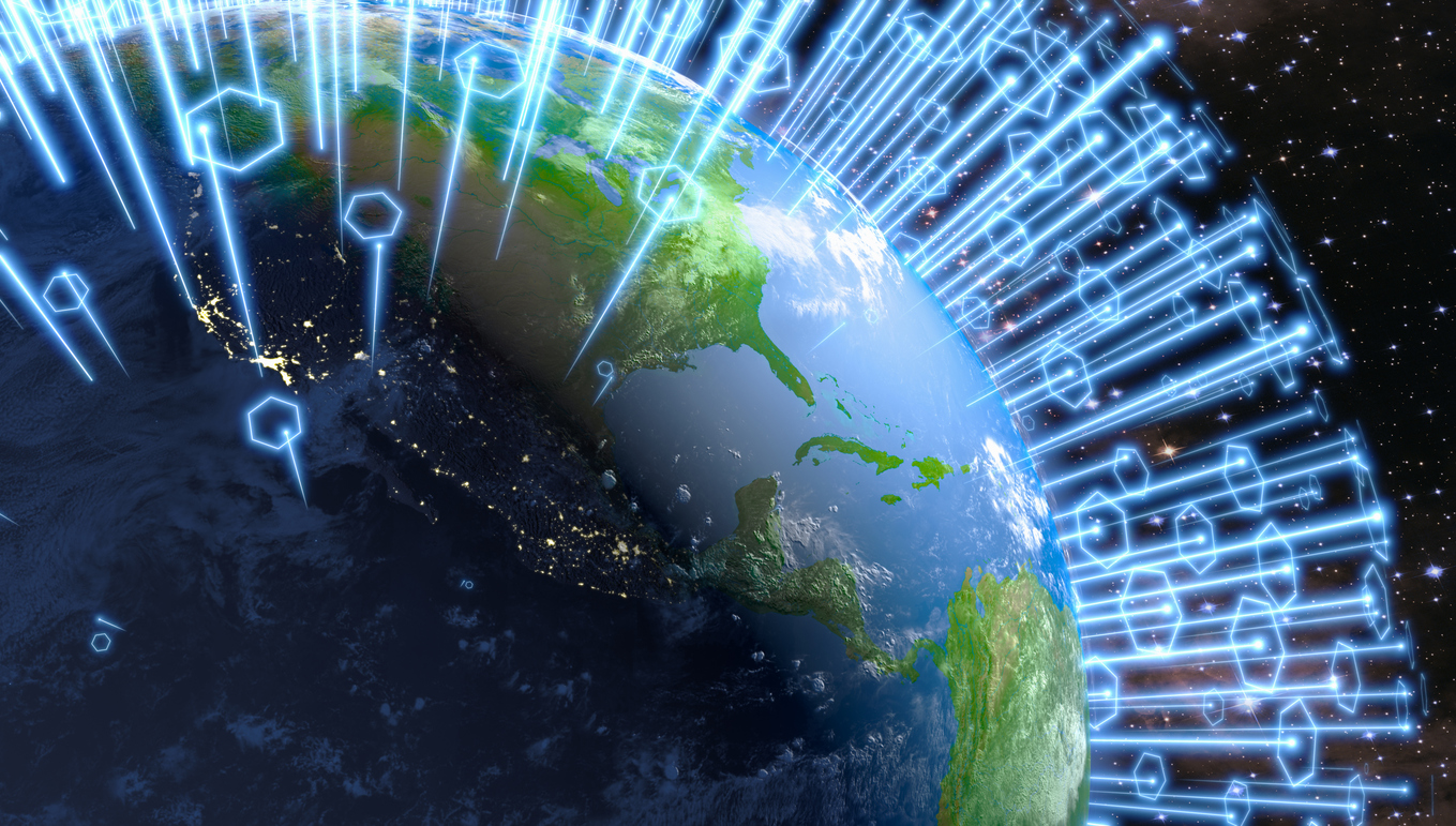 Data center flexibility: This image depicts Earth with a graphical overlay of blue, glowing communication or data lines and symbols, suggesting global connectivity or a digital network.